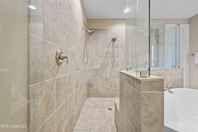 5110 Kensington Creek Dr, Southaven, MS 38672 - bathroom with a tile shower and a soaking tub