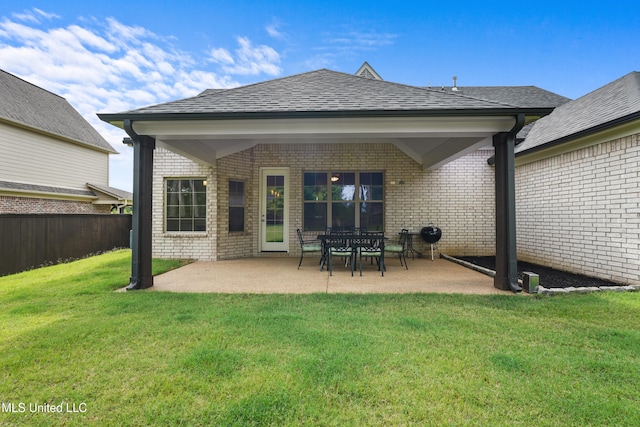 5110 Kensington Creek Dr, Southaven, MS 38672 - rear view of property with brick siding, a patio area, and roof with shingles