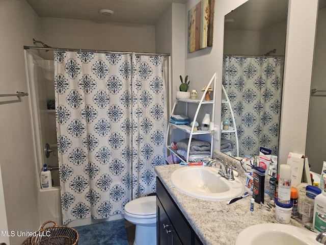 2205 Magazine St, Ocean Springs, MS 39564 - bathroom with double vanity, a shower with curtain, and toilet