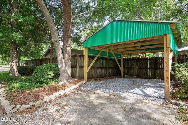 view of outdoor structure with a carport