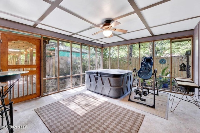 sunroom / solarium featuring ceiling fan and coffered ceiling