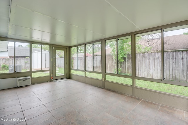 12082 Marlane Pl, Gulfport, MS 39503 - unfurnished sunroom with an AC wall unit