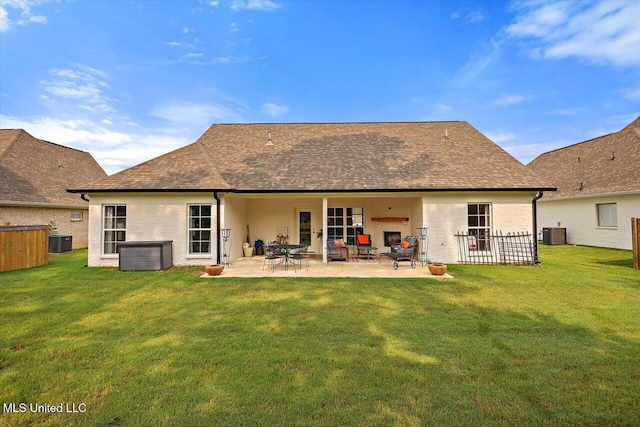 122 Seymour Dr, Madison, MS 39110 - back of property with cooling unit, a patio, a lawn, and roof with shingles