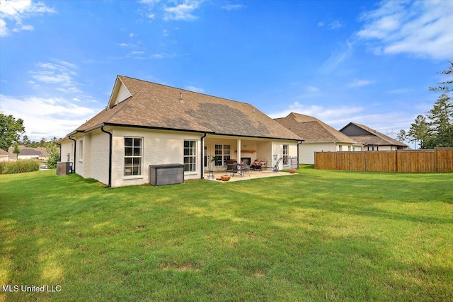 122 Seymour Dr, Madison, MS 39110 - back of property with a patio area, central AC, and a shingled roof