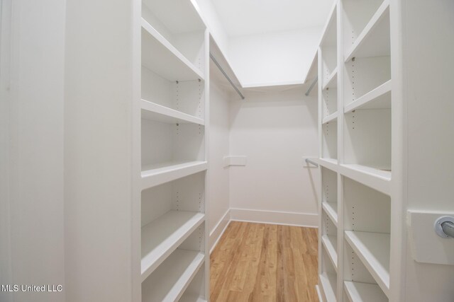 103 E 2nd St, Pass Christian, MS 39571 - spacious closet with wood finished floors