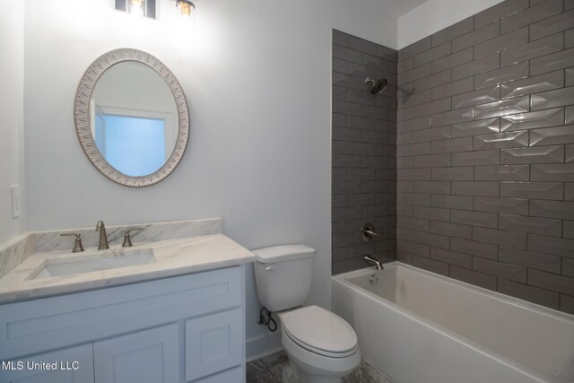 103 E 2nd St, Pass Christian, MS 39571 - bathroom featuring toilet, vanity, and washtub / shower combination