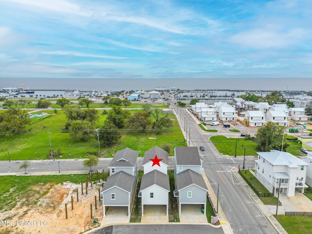 103 E 2nd St, Pass Christian, MS 39571 - drone / aerial view with a residential view and a water view