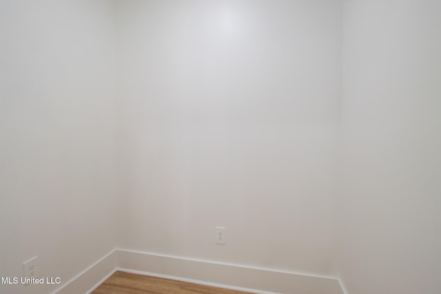 103 E 2nd St, Pass Christian, MS 39571 - unfurnished room with light wood-style flooring and baseboards
