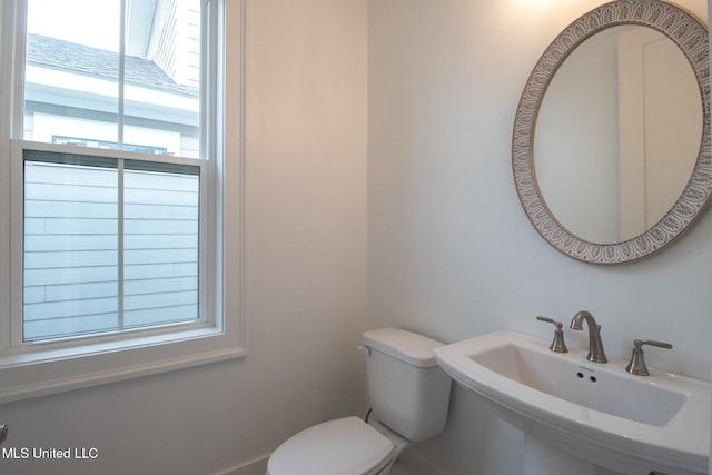 103 E 2nd St, Pass Christian, MS 39571 - bathroom with toilet and a sink