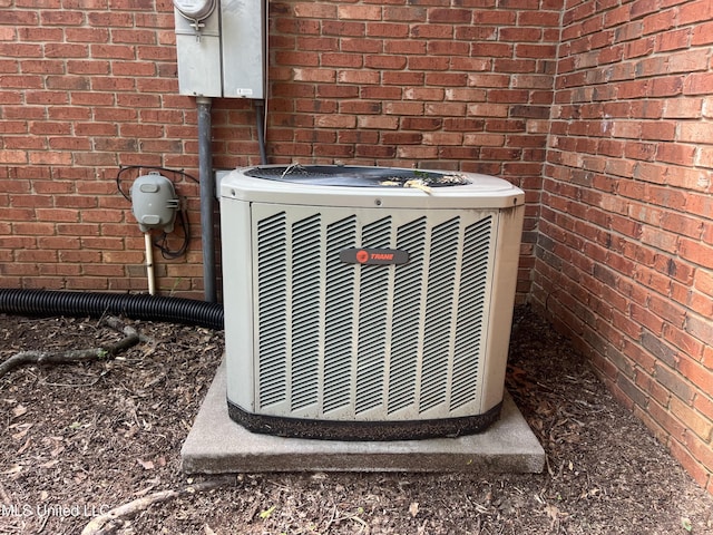 3057 Windwood Cir, Flowood, MS 39232 - exterior view of central air condition unit, brick siding, and electric meter