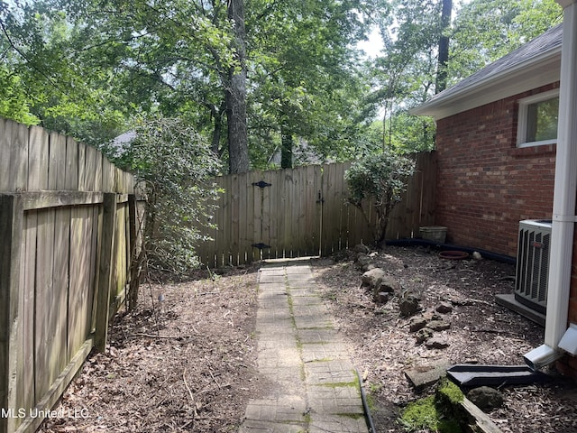 3057 Windwood Cir, Flowood, MS 39232 - fenced backyard with central AC unit