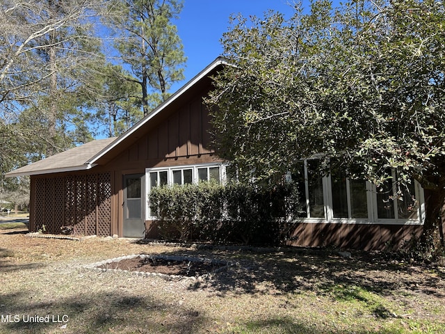 view of home's exterior with board and batten siding