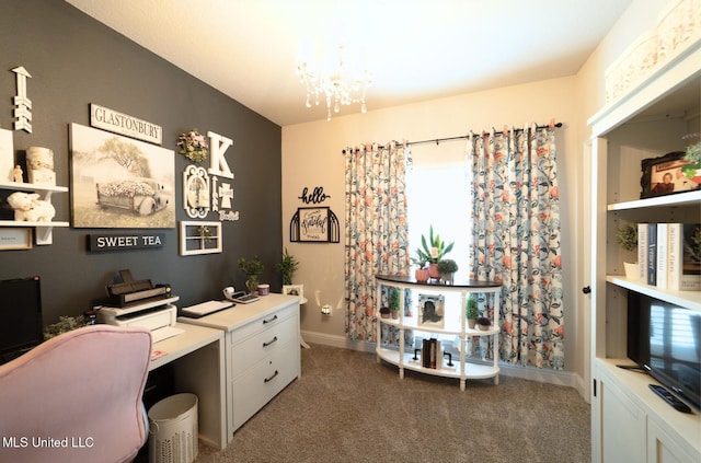 home office featuring carpet floors, a chandelier, and a healthy amount of sunlight