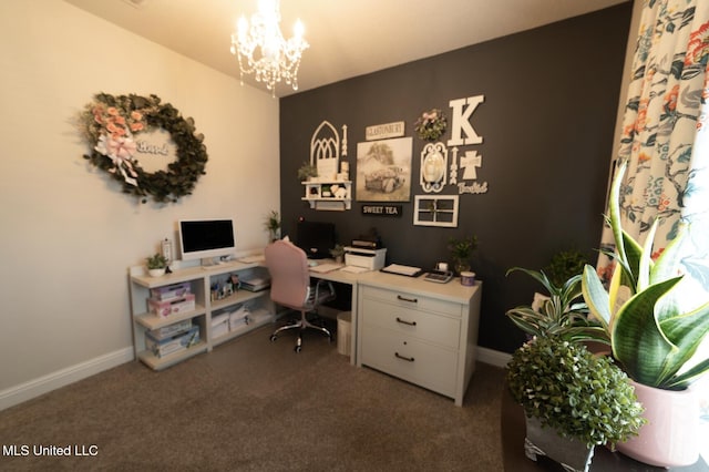 carpeted office space featuring baseboards and a chandelier