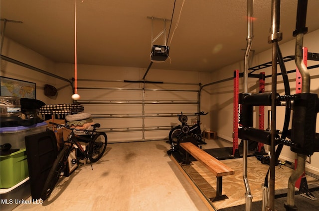 garage featuring a garage door opener
