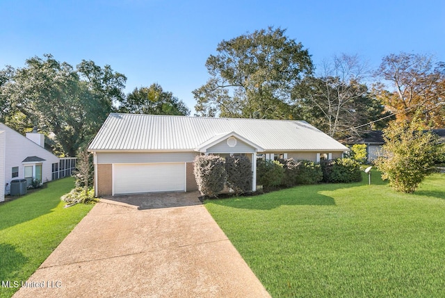 view of front of house featuring central AC and a front yard