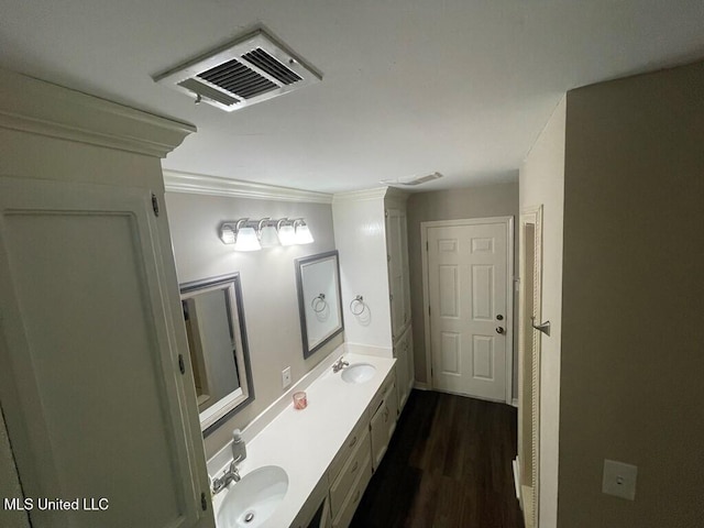 bathroom featuring hardwood / wood-style floors and vanity