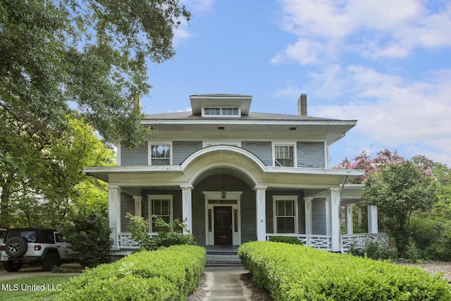 1704 N State St, Jackson, MS 39202 - traditional style home featuring a chimney and a porch