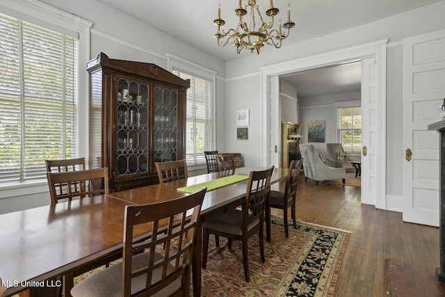 1704 N State St, Jackson, MS 39202 - dining room with a chandelier and hardwood / wood-style flooring