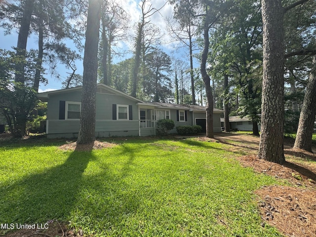 1870 Wisteria Dr, Jackson, MS 39204 - view of front of house with a front yard and crawl space