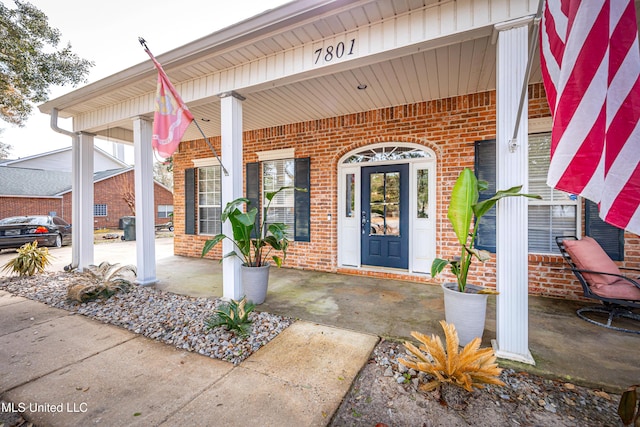 entrance to property with a porch