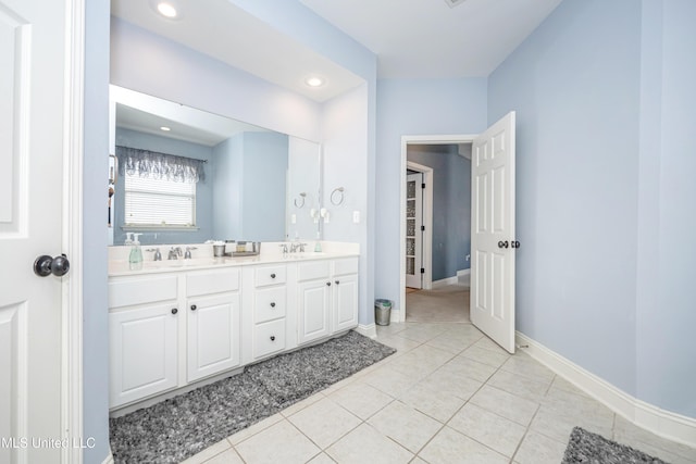 bathroom featuring vanity and tile patterned floors