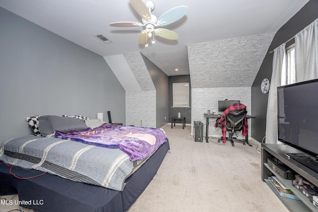 bedroom with lofted ceiling, carpet floors, and ceiling fan