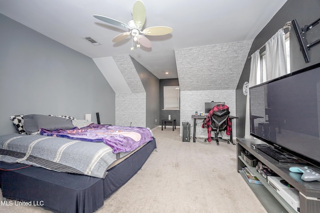 bedroom featuring lofted ceiling, ceiling fan, and carpet flooring