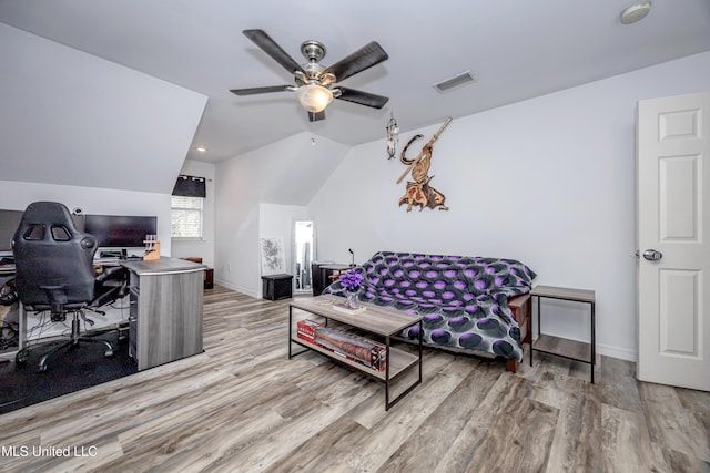 office with ceiling fan, lofted ceiling, and light wood-type flooring