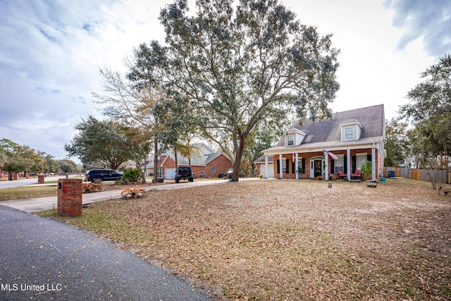 view of yard with covered porch