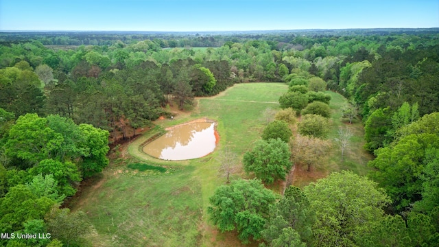 aerial view with a water view and a view of trees