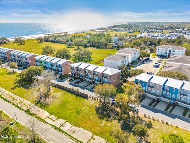 bird's eye view featuring a residential view and a water view