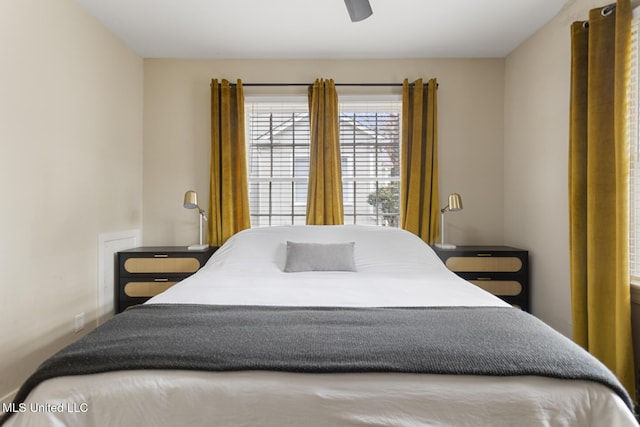 bedroom featuring ceiling fan