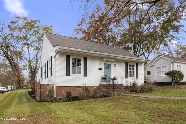 view of front of home featuring a front yard