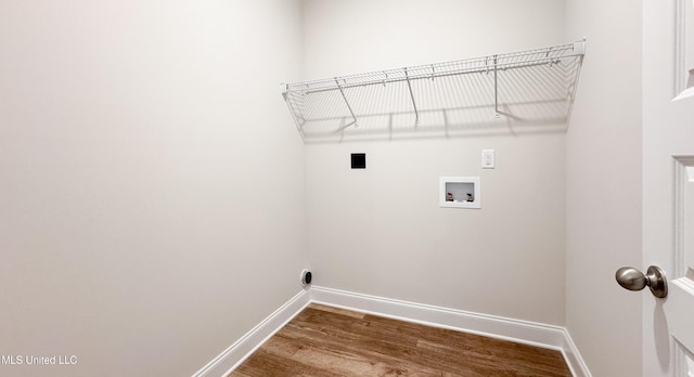 clothes washing area featuring washer hookup, wood-type flooring, and hookup for an electric dryer