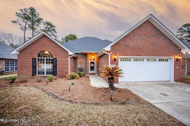 view of front of property with a garage