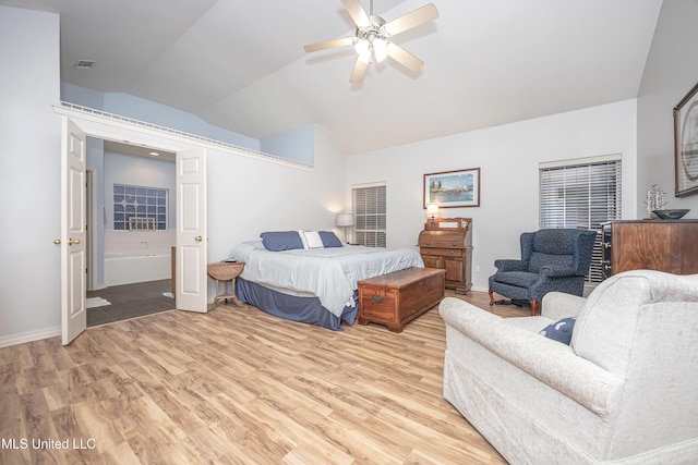 bedroom featuring a ceiling fan, vaulted ceiling, light wood-style floors, and visible vents