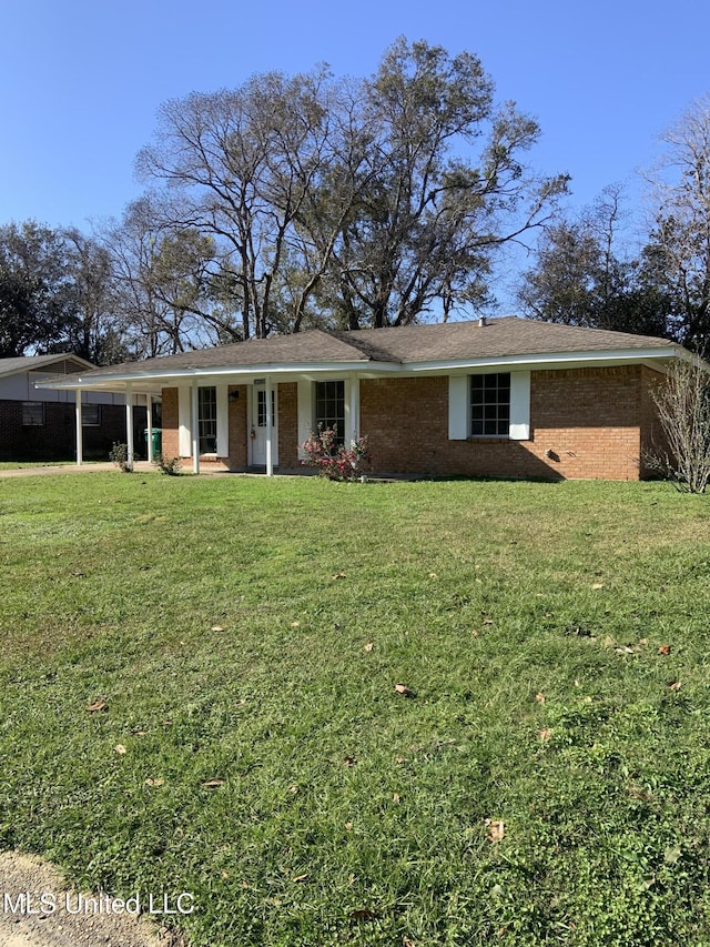 ranch-style home with a front yard