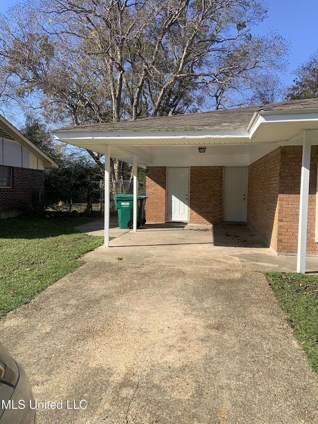 view of car parking featuring a carport