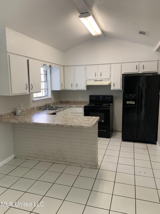 kitchen featuring sink, black appliances, white cabinets, vaulted ceiling, and kitchen peninsula