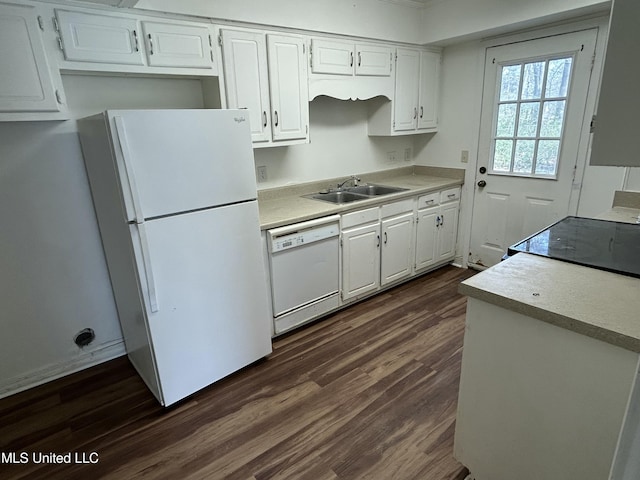 kitchen with a sink, white appliances, dark wood-type flooring, and white cabinetry