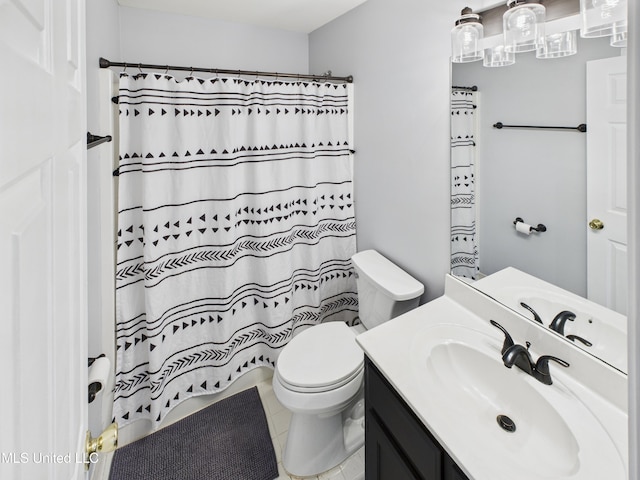 5710 Southbend Ln, Olive Branch, MS 38654 - full bathroom featuring vanity, curtained shower, and tile patterned floors