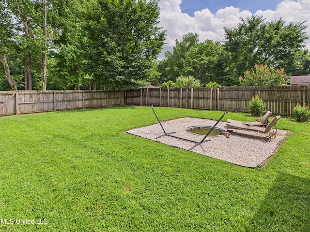 5710 Southbend Ln, Olive Branch, MS 38654 - fenced backyard with a patio area