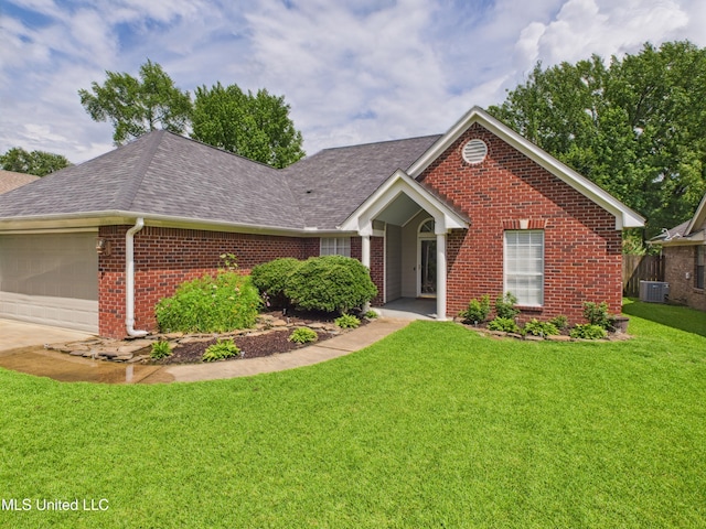 5710 Southbend Ln, Olive Branch, MS 38654 - view of front of house featuring brick siding, roof with shingles, an attached garage, a front yard, and concrete driveway