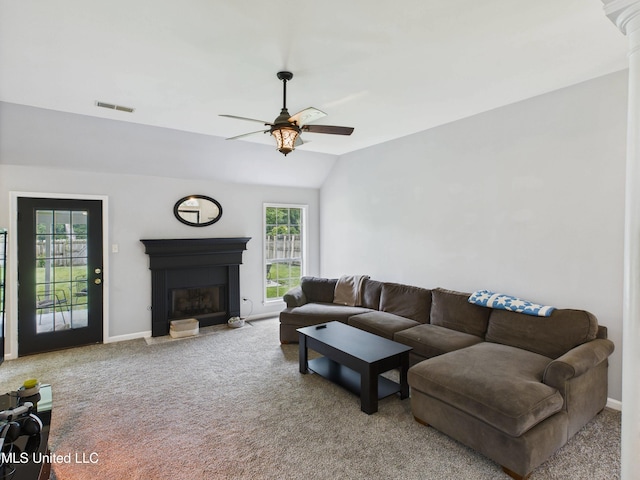 5710 Southbend Ln, Olive Branch, MS 38654 - living area featuring ceiling fan, carpet floors, a glass covered fireplace, and lofted ceiling