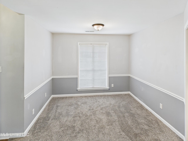 5710 Southbend Ln, Olive Branch, MS 38654 - carpeted spare room featuring baseboards
