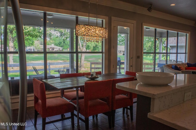 414 Spike Rdg, Canton, MS 39046 - dining space with tile patterned flooring and plenty of natural light