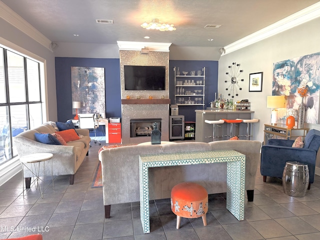 414 Spike Rdg, Canton, MS 39046 - tiled living room featuring ornamental molding, a fireplace, and recessed lighting