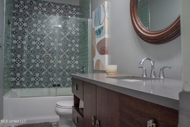 414 Spike Rdg, Canton, MS 39046 - bathroom with toilet, shower / bath combination with glass door, and vanity