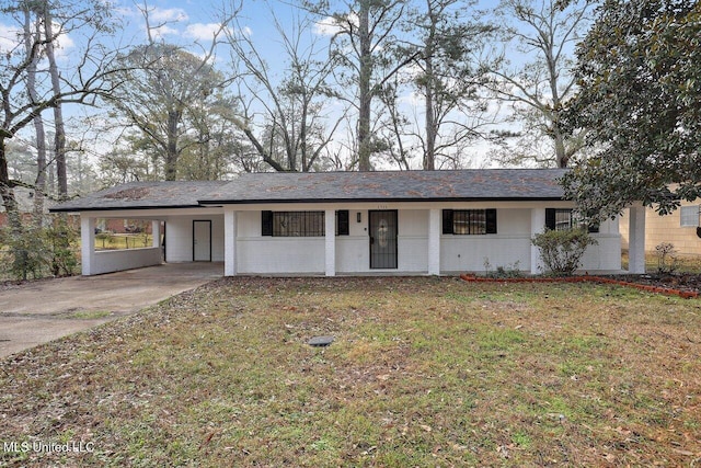 single story home featuring a carport and a front lawn